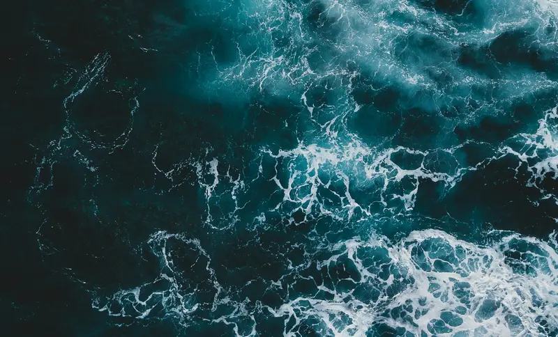 Aerial view of deep blue ocean waves
